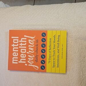 A Book Titled "Mental Health Journal Daily Check-in